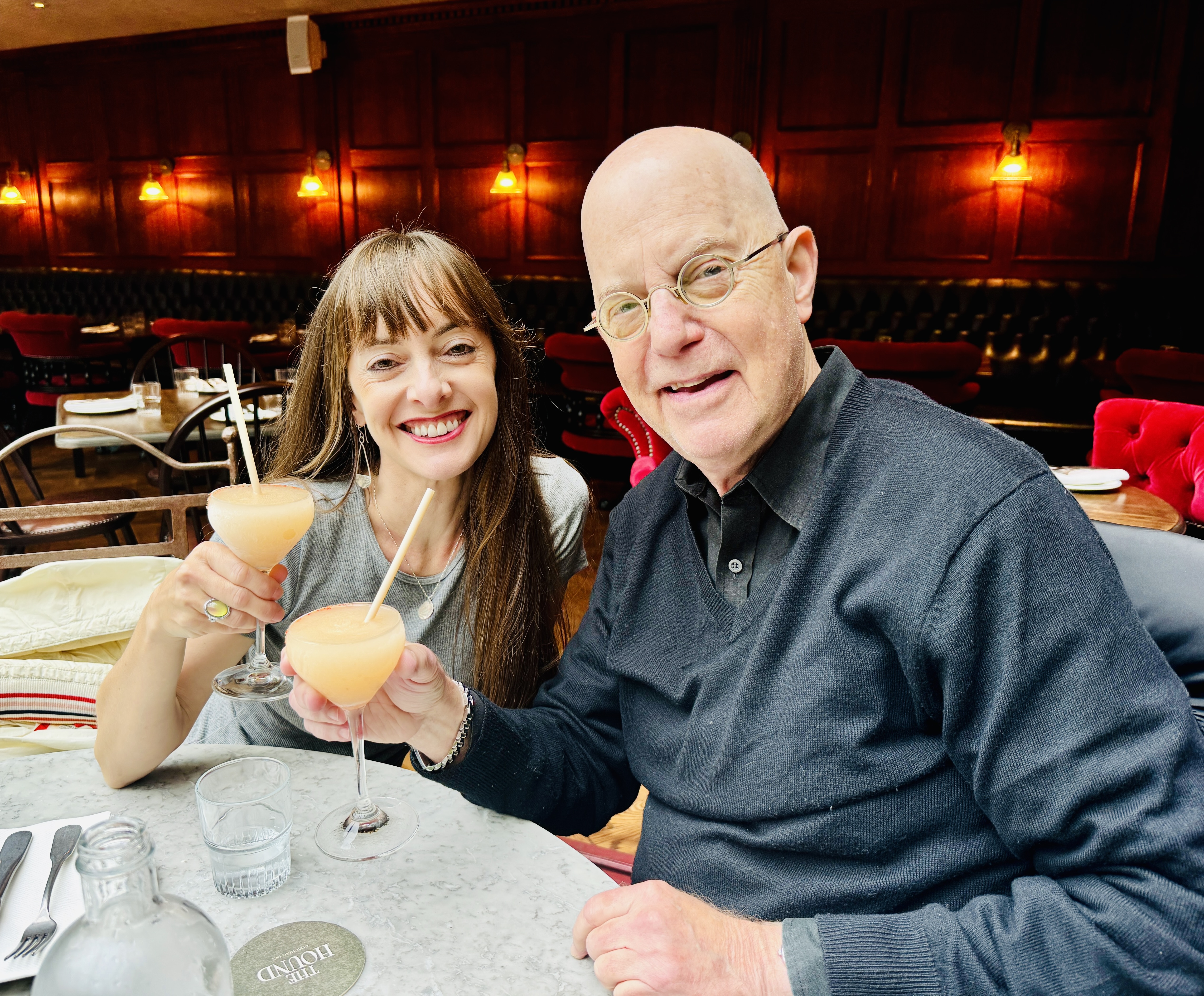 Richard at a nice restaurant with cocktails