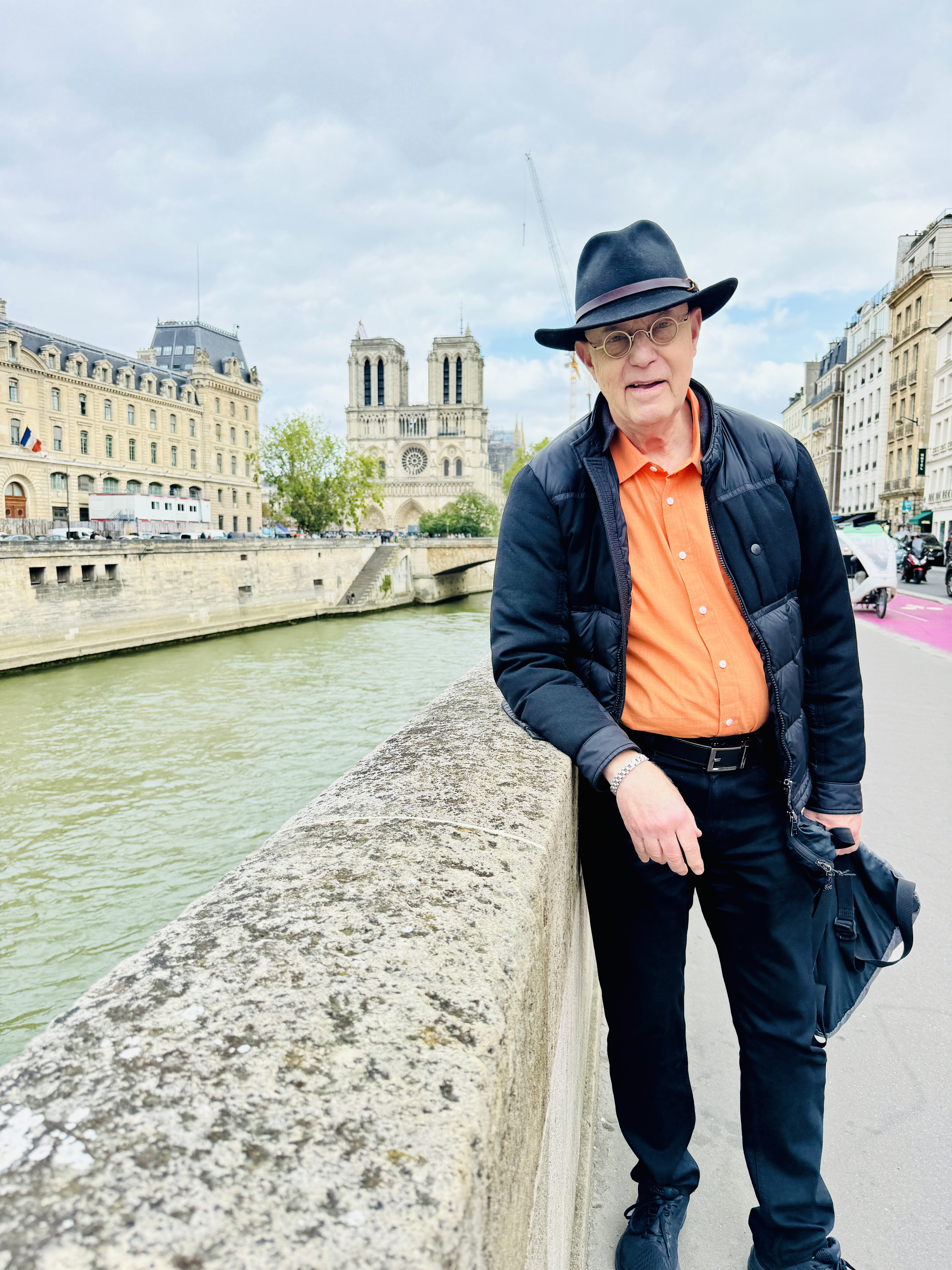 Richard in Paris with Notre Dame behind him